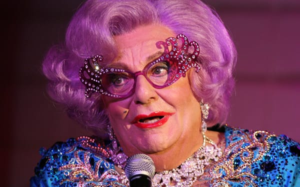 Dame Edna creator says “evil” teachers are telling kids to be transgender
