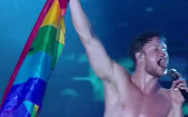 Imagine Dragons singer Dan Reynolds waves Pride flag at concert