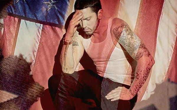 Eminem clarifies his claim that he uses gay app Grindr to find dates