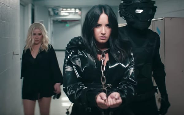 Christina Aguilera and Demi Lovato fight back in Fall In Line music video