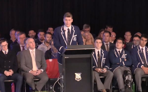 Watch this teen get a standing ovation after coming out as gay at school
