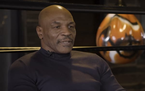 Mike Tyson had to stop his daughter from “attacking” transphobic rapper Boosie Badazz