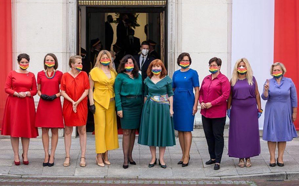 Polish MPs coordinate outfits to create rainbow flag at swearing in ceremony for homophobic president