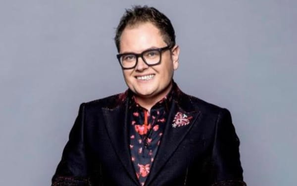 Alan Carr issues update after collapsing on stage: “I’ve never known pain like it”