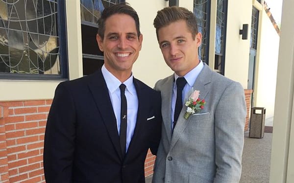 Former football star Robbie Rogers has married his partner Greg Berlanti