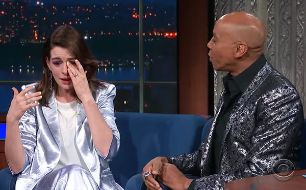 Anne Hathaway bursts into tears after being surprised by her idol RuPaul