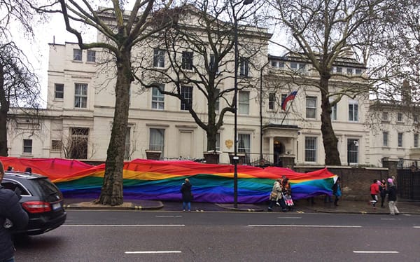 Russian embassy wrapped in rainbow flag to protest Chechnya’s anti-gay purge