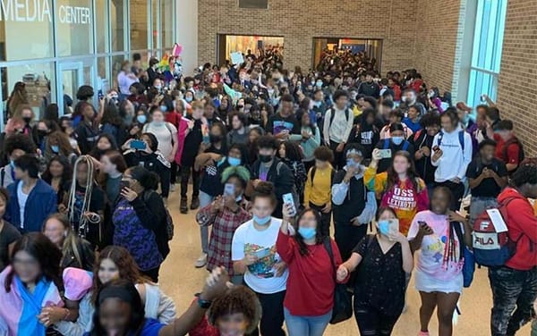 Students walk out of class in support of trans student banned from changing room