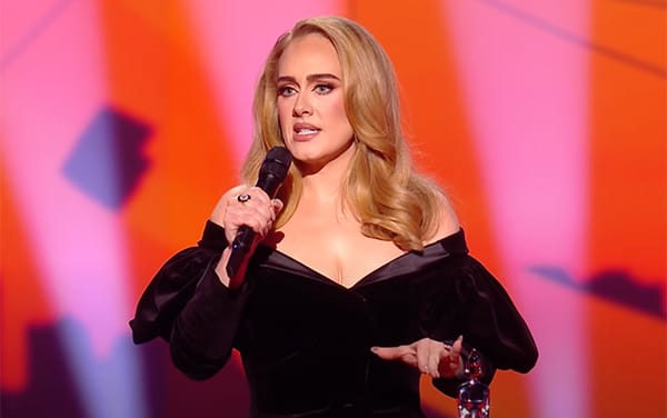 Adele declares “I love being a woman” as she accepts gender-neutral Brit award