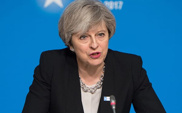 Theresa May “deeply regrets” anti-gay laws introduced by Britain