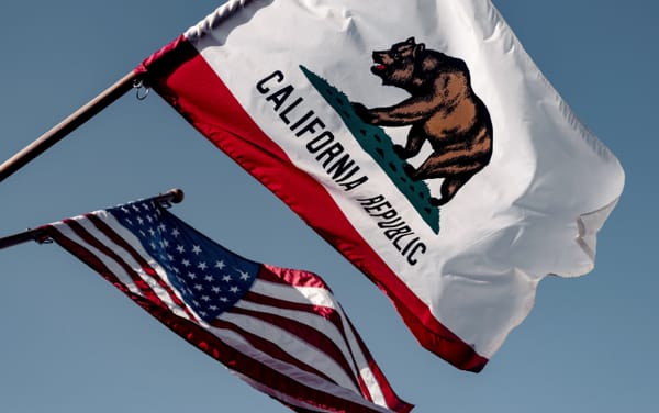 California governor Gavin Newsom signs bill offering legal refuge for out-of-state trans youth