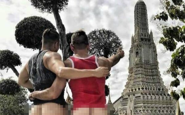Gay couple arrested after exposing their butts at sacred Thailand temple