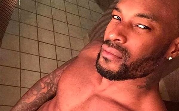 Tyson Beckford leaves fans begging him to “drop the towel” with steamy photo
