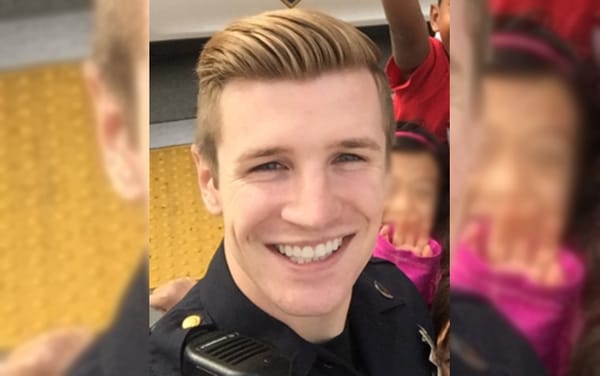 Gay police officer wins $225,000 in workplace discrimination lawsuit